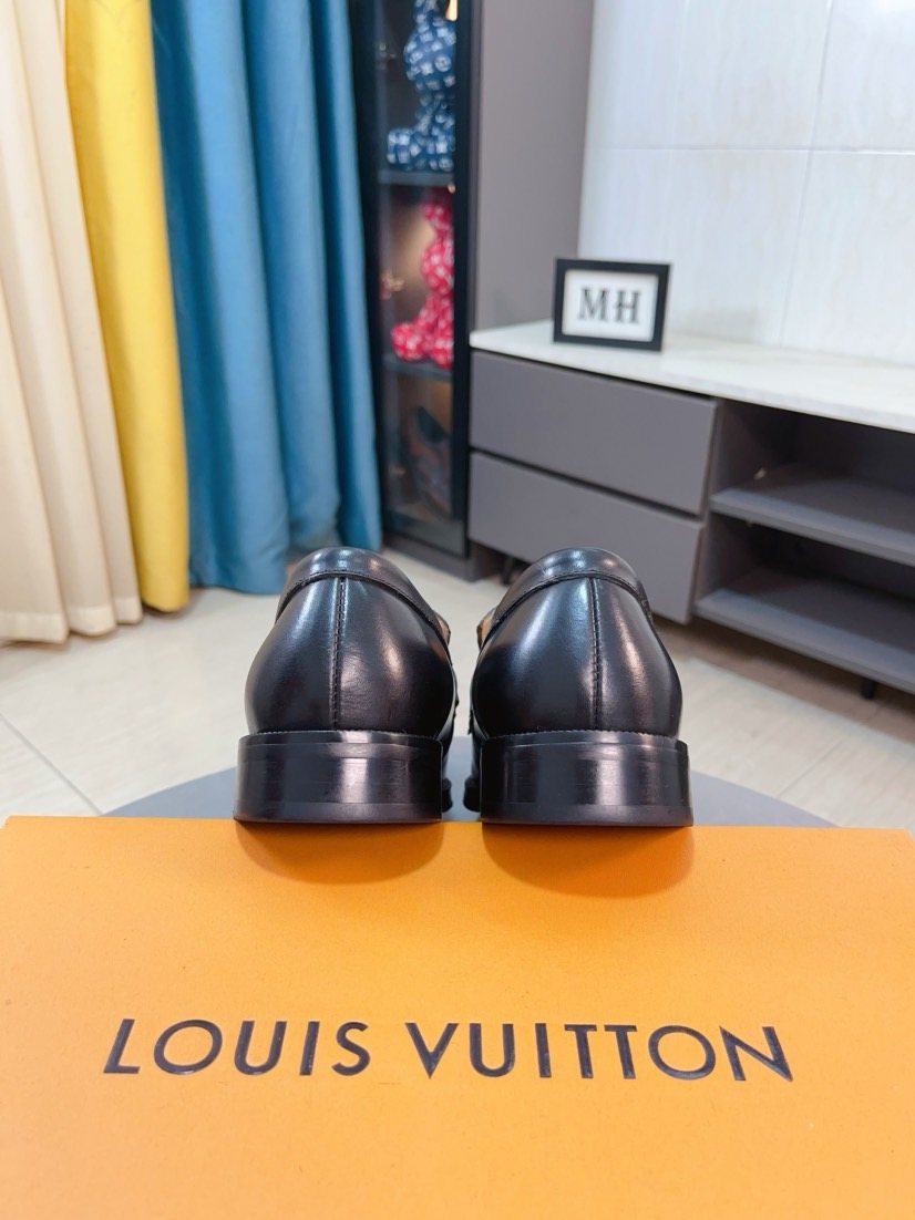 Louis Vuitton Men's Black Textured Buckle Loafers - Rounded Toe And Dark Sole