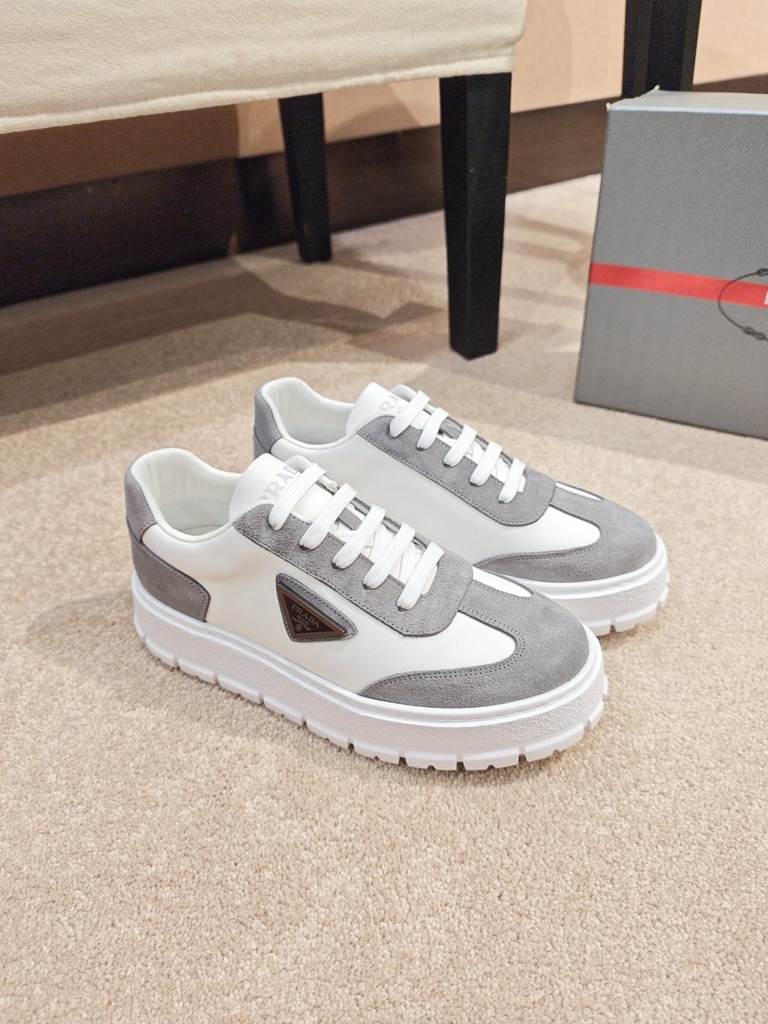 Prada Triangle Plaque Low-Top Sneakers - Lugged Outsole