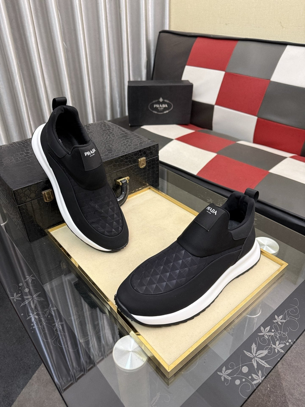 Prada Black Quilted Slip-On Sneakers